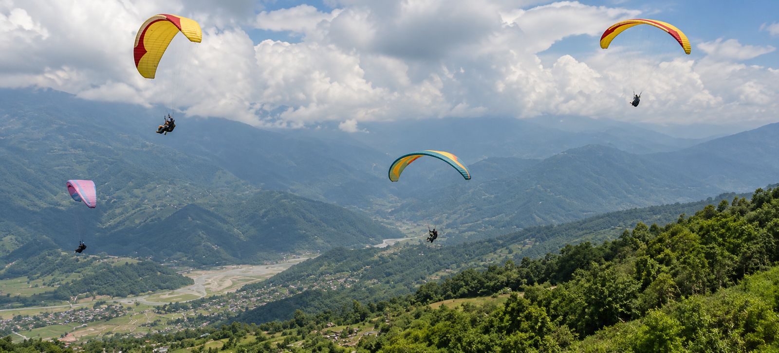 Paragliding Over the Valley